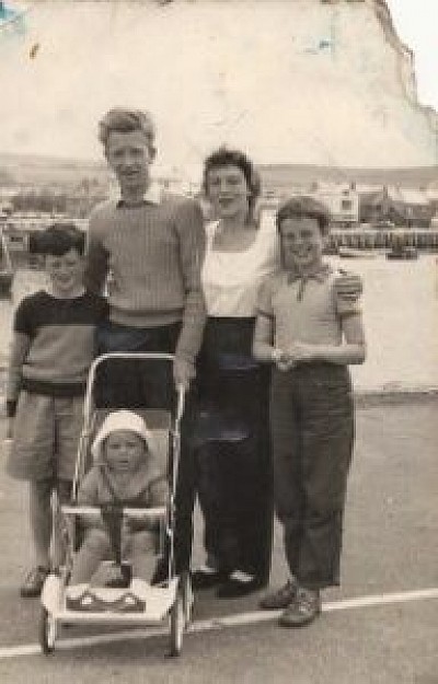 Bridport harbour. 1959. I'm the one in the pushchair. Notice my brother John, (left in the photo), looking down at the rings. © C Goodland / Beach Thorncombe
